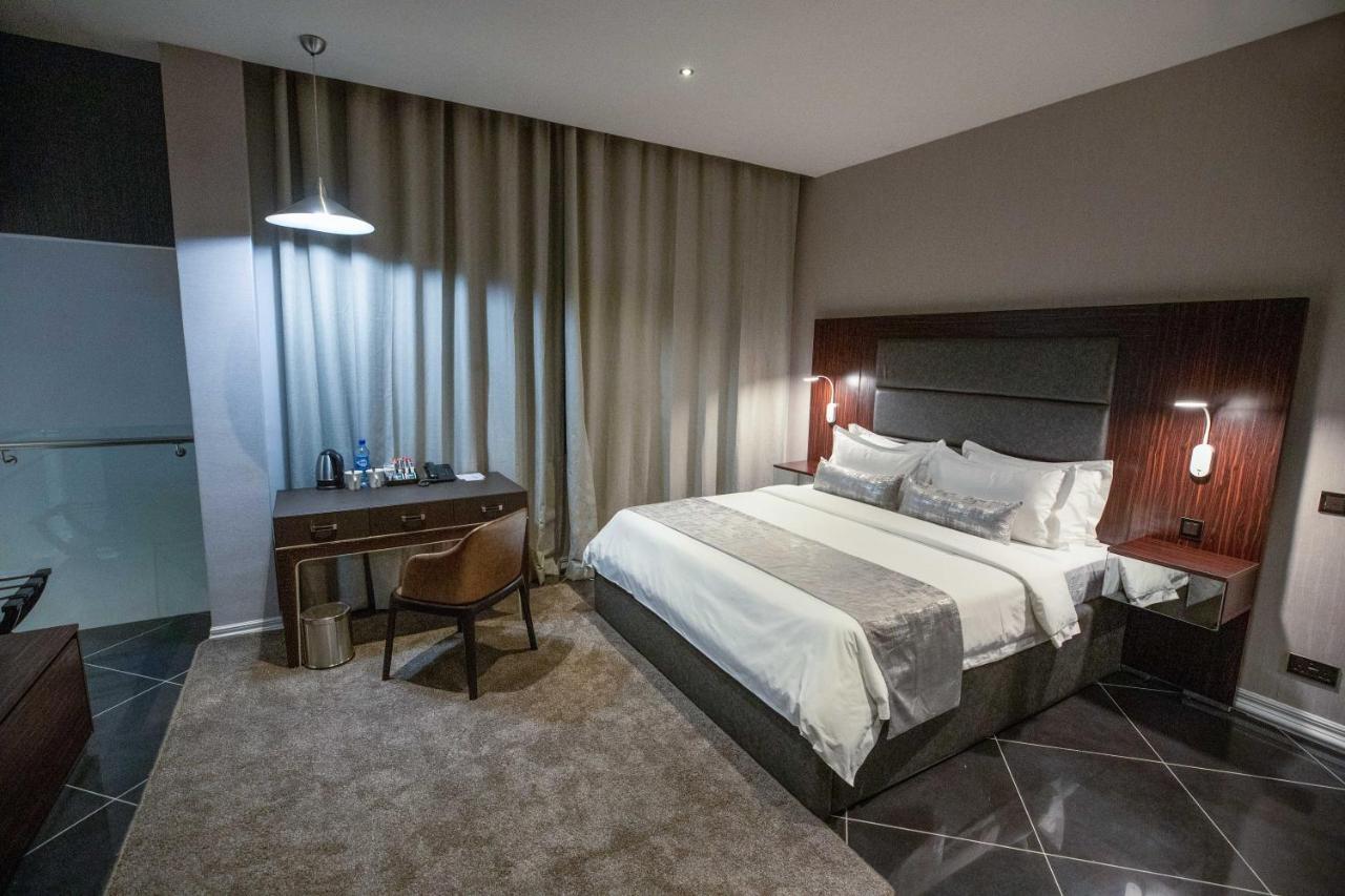 Bon Hotel Tripod Оверри Экстерьер фото